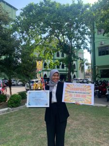 Maimunah Pasaribu, Mahasiswa KPI Raih Juara 1 Lomba International News Anchor dalam DACOMFEST 2024